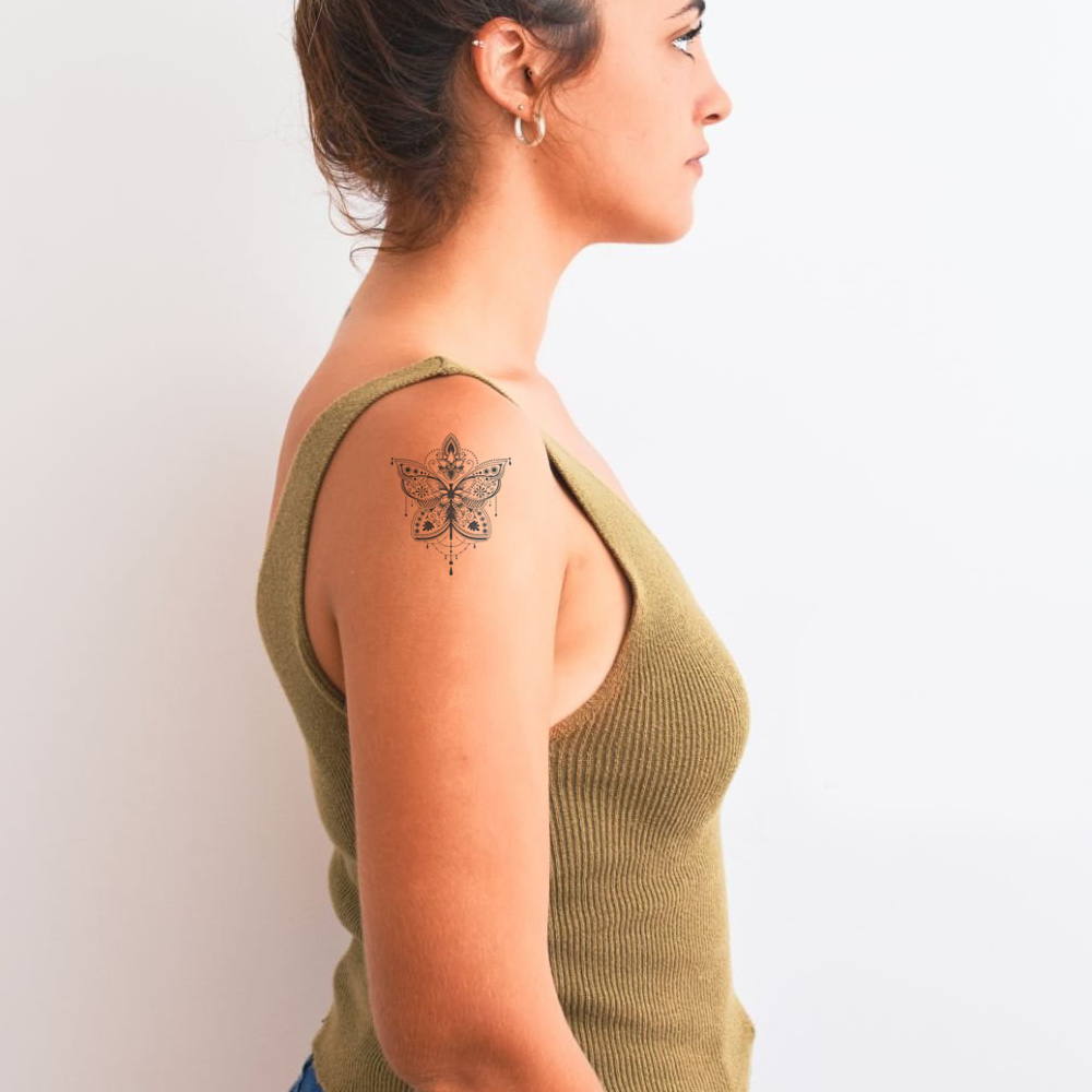 ornate butterfly tattoo